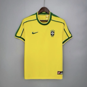 Brazil 1998 retro home jersey, bright yellow with green trim and blue shorts, featuring the iconic CBF crest and Nike logo.